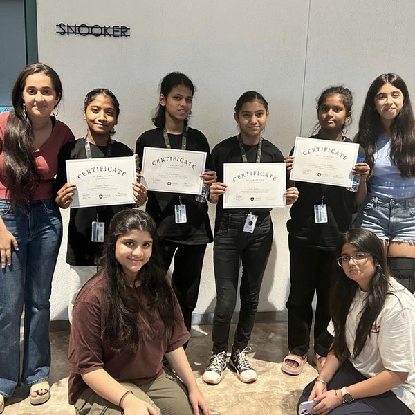 TalentX volunteers with students